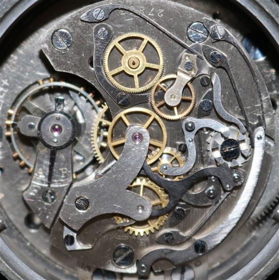 A Messerschmitt cockpit timepiece, numbered 30600, mounted on a piston head, 5.25in.